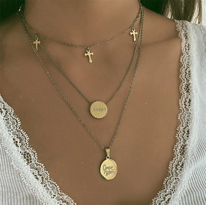 Triple layer gold stainless steel necklace set with cross pendants and Carpe Diem engraving
