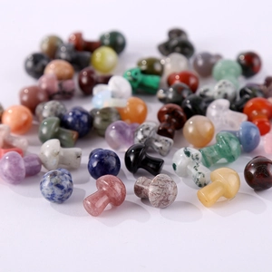 Various colorful natural stone mushroom figurines including rose quartz and amethyst crystals