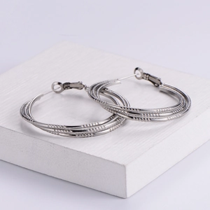 Textured silver triple hoop earrings for women crafted from polished stainless steel