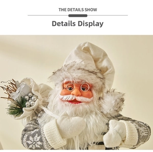 Detail of Santa Claus doll with white beard, metal glasses and snowflake knitted sweater
