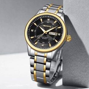 Detail view of steel watch with black dial, luminous markers, and day-date display