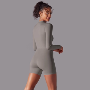 Rear side view of light grey long sleeve yoga bodysuit with slim-fit compression design
