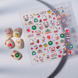 3D embossed Christmas nail art stickers with red and green reindeer and cat designs