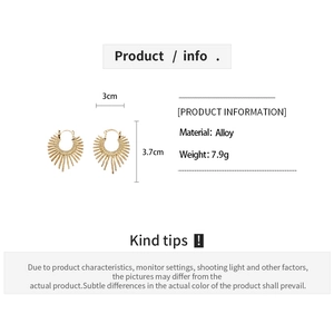 Detail view of gold irregular hollow earrings with size dimensions 3cm by 3.7cm