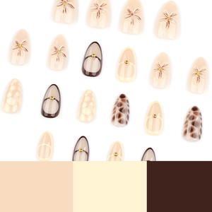 3D floral press-on nails with leopard patterns and gold beads in almond shape