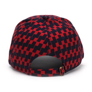 Close-up of red and black checkered baseball cap back with metal adjustable buckle strap