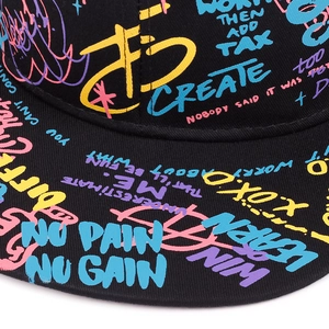 Macro detail of high-quality colorful graffiti prints on black hip-hop cotton baseball cap