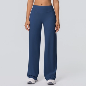 Detail of high-waisted wide-leg yoga pants in navy blue with soft elastic fabric