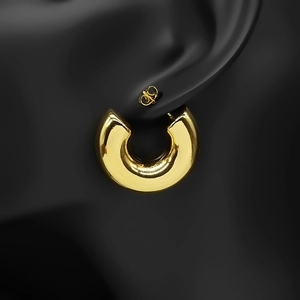 Minimalist thick gold C-shaped hoop earrings with a high-polished mirror finish