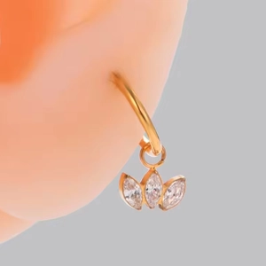 Titanium alloy nose ring with three marquise-cut gold-tone dangling zircon stones