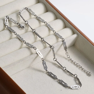 Detail of silver stainless steel chain with lobster clasp and adjustable link chain