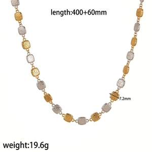 Detail view of gold and silver textured square link necklace with dimensions and weight