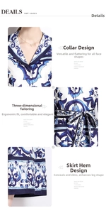 Detail view of blue floral shirt dress showing collar, waist belt, and hemline details