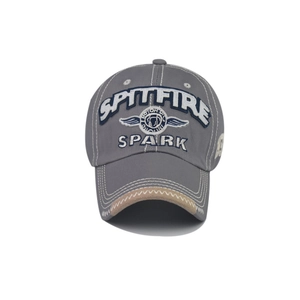 Detail of vintage gray cotton baseball cap featuring SPARK 3D embroidery and contrast brim