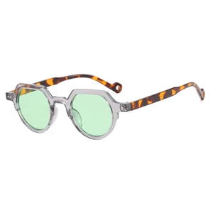 Retro polygon round sunglasses with transparent grey frame and tortoise temples