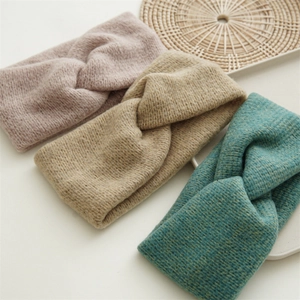 Knitted twist headbands in pink, khaki and blue colors for winter warmth and style