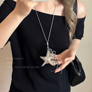 Vintage starfish pendant necklace with polka dot rope knot on a long silver chain