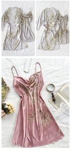 Detailed view of floral printed silk pajamas set featuring lace straps and matching robes