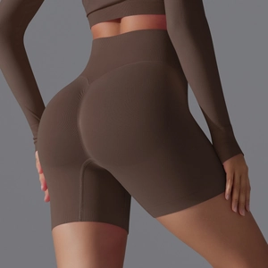 Close-up of ribbed coffee brown yoga shorts featuring high waist and scrunch butt detail