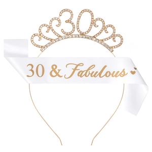 Detail of 30 & Fabulous gold rhinestone tiara and white satin sash for birthday party