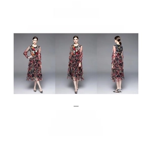 Détails de la robe en tulle à taille haute avec broderie florale 3D colorée