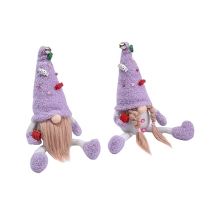 Pair of purple Christmas plush gnomes with candy-accented hats and soft faux fur beards