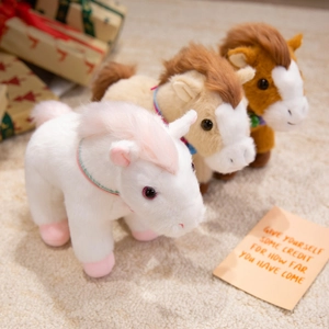 Three cute stuffed pony plush toys in white and brown colors on a warm beige rug