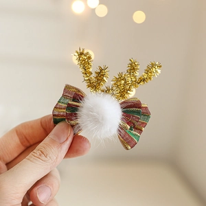 Pince à cheveux de Noël avec bois de renne dorés et nœud à rayures rouges et vertes
