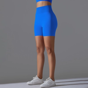 Close-up of high-waisted seamless royal blue yoga shorts for gym and running workouts