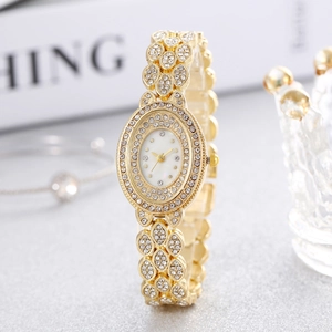Fashionable gold women's watch with oval dial and full rhinestone paved steel bracelet
