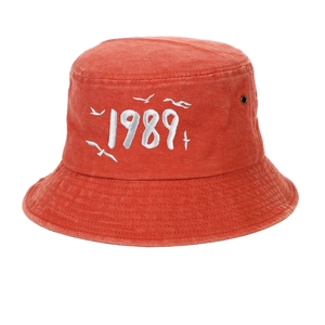 Detailed embroidery of 1989 and seagulls on a washed brick red cotton baseball cap