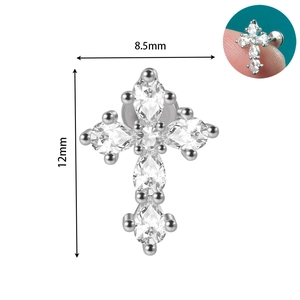 Detailed view of stainless steel cross earring with sparkling cubic zirconia stones