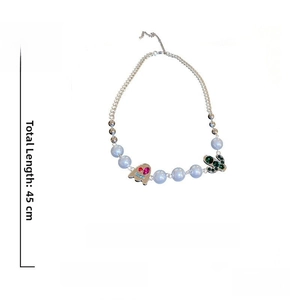 Detail showing 45cm length and 23g weight of the cactus ghost pearl necklace