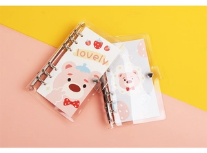 Detail of A6 transparent PVC binder cover with cute cartoon bear motifs and lovely text
