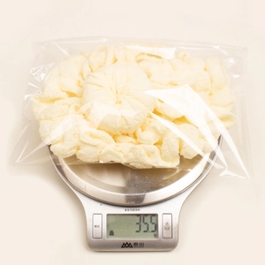 Detailed weight measurement showing 35.5g for soft doughnut baby turban hat in packaging