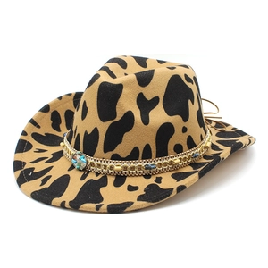 Western style cow print felt jazz hat with ethnic braided band and turquoise accents