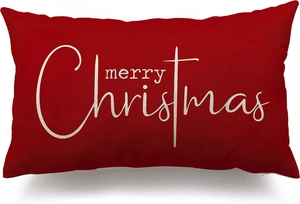 Detailed close-up of red linen Christmas pillowcase with white merry Christmas print