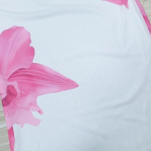 Detailed macro view of pink floral mesh fabric with a fine breathable texture