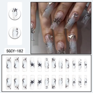 Long coffin press-on nails with blue ice-translucent star and heart rhinestone art