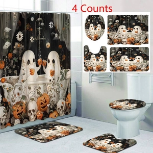 Detail of 4-piece Halloween bathroom set featuring ghost tea party and pumpkin motifs