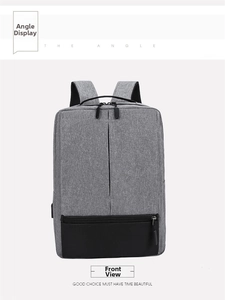 Detailed view of grey business backpack with waterproof fabric and USB charging port