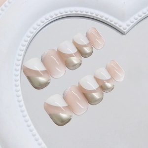 Elegant oat nude press-on nails with silver glitter edges and geometric mosaic art