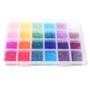 Macro shot of 24-compartment storage box filled with colorful 4mm crystal glass beads