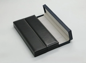Detail of rectangular PU leather watch boxes with contrast stitching and soft lining