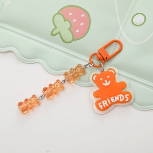 Cute orange acrylic bear keychain with FRIENDS text and transparent bear link chain