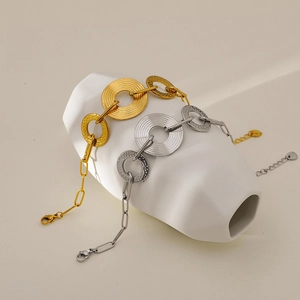 Minimalist hammered bamboo chain bracelet in gold and silver finish with textured pendants