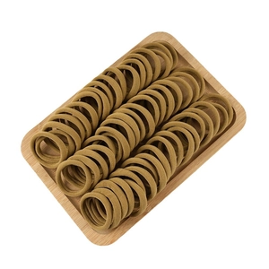 Bulk 50pcs olive green thick elastic hair ties set displayed on a wooden tray