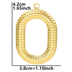 Detail showing 4.2cm golden oval pendant with caviar texture and size measurements
