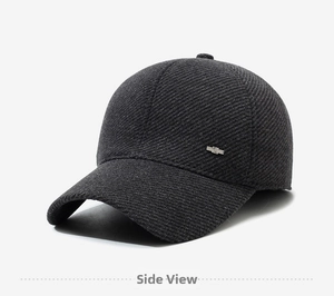 Side view of dark gray winter baseball cap showing premium wool texture and metal logo