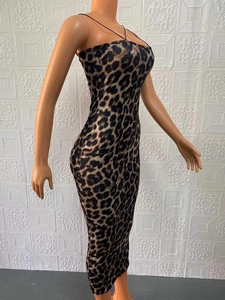 Detail of slim fit leopard print midi dress showing back crisscross spaghetti straps